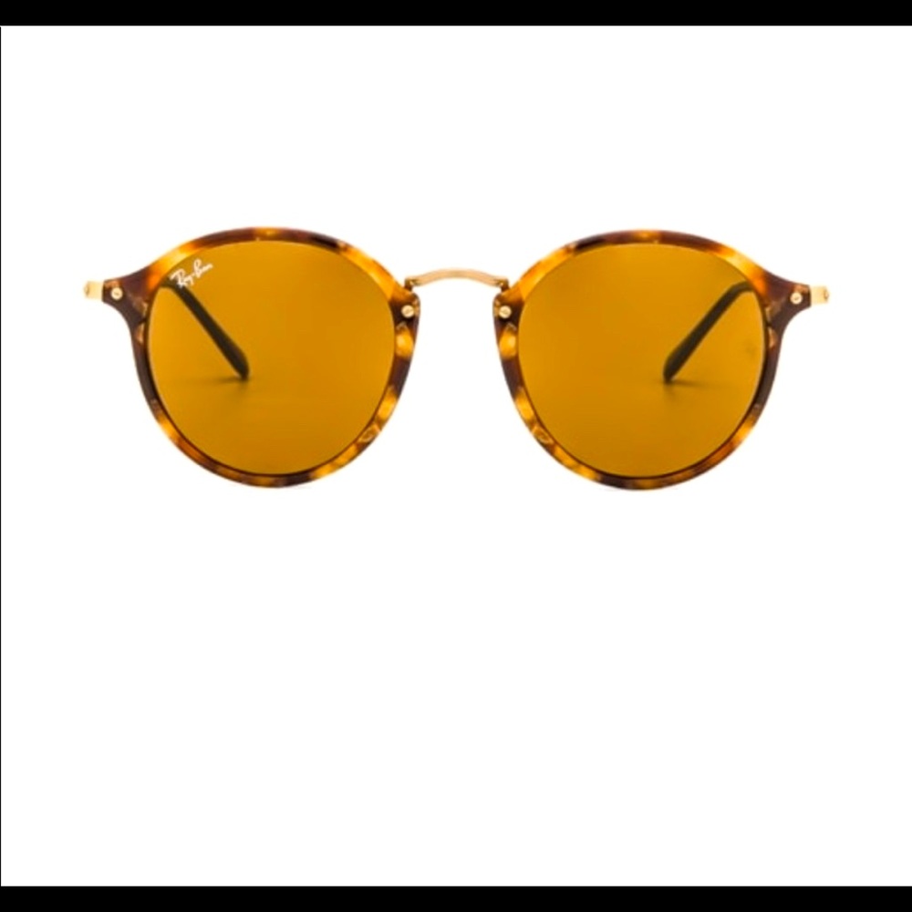 Rayban Round Fleck Sunglasses with brown lenses and tortoise frame.